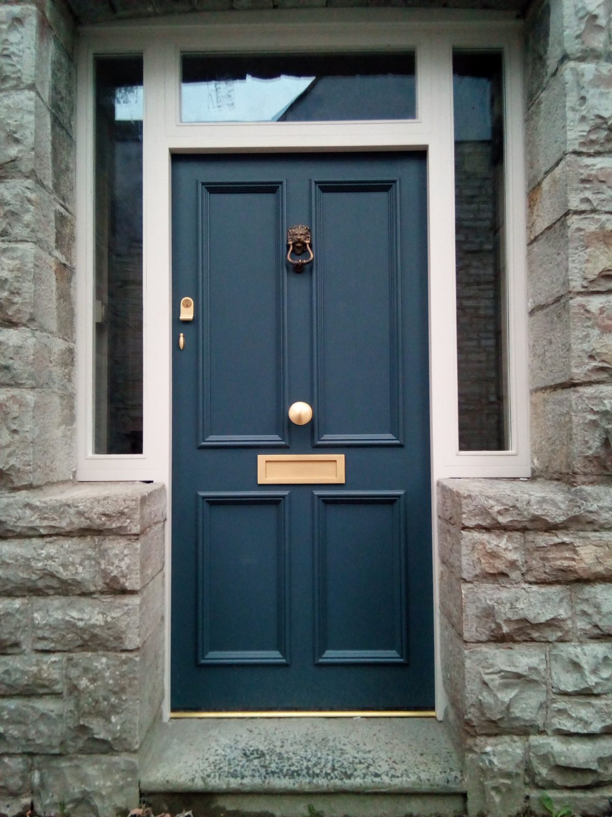 Mauve painted door with glazed top