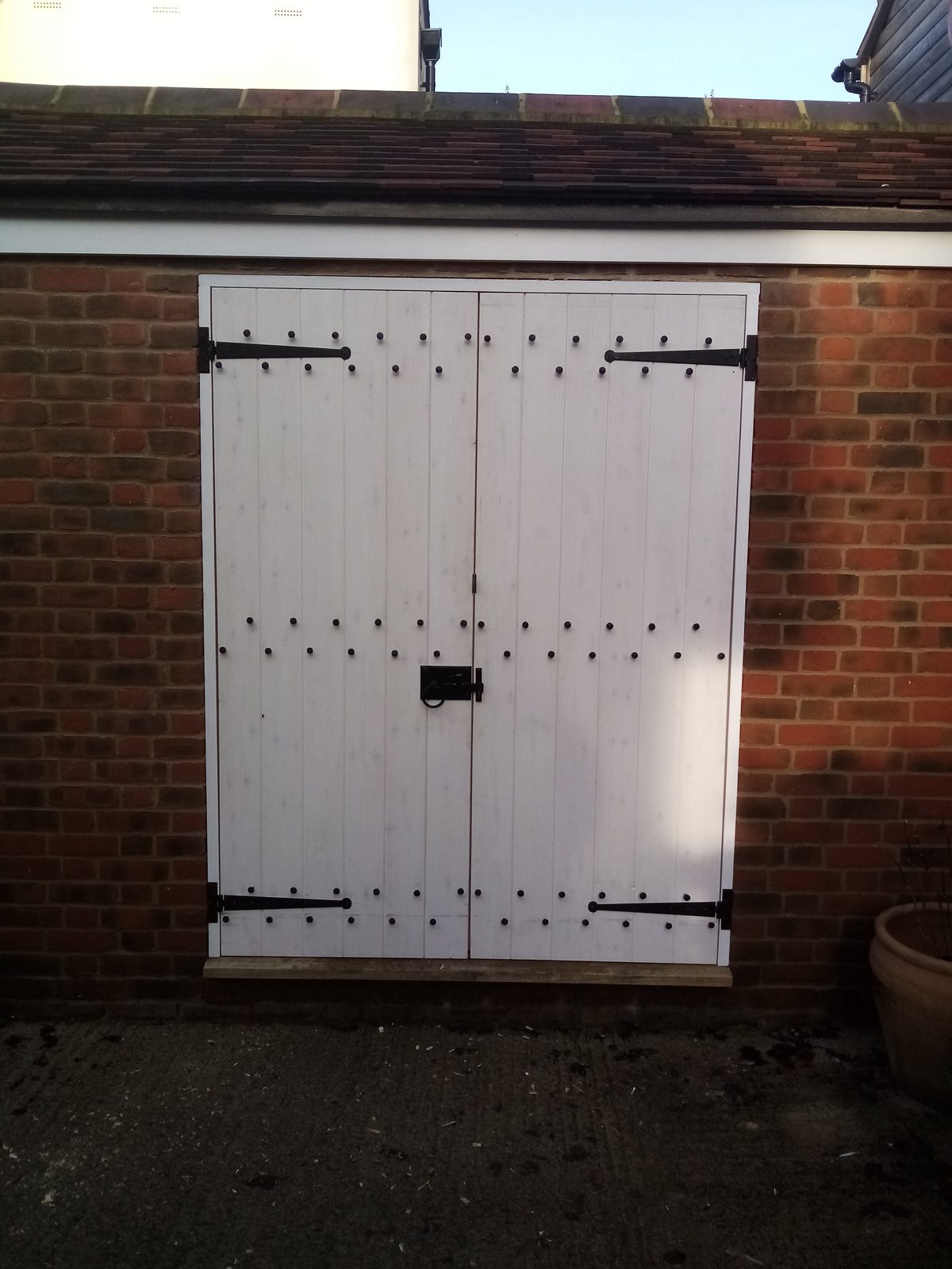 Side-hung garage doors